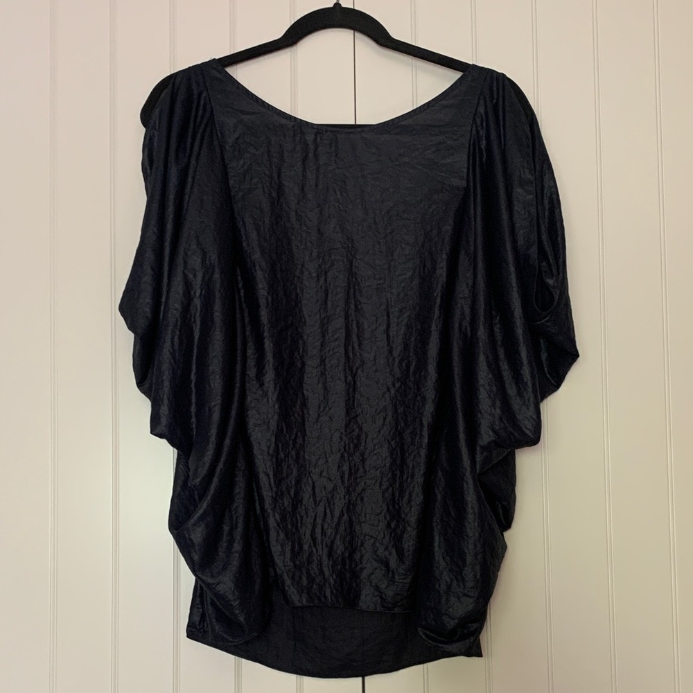 Beautiful top by BCBG, mint condition